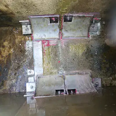 four steel corner forms installed in a box culvert