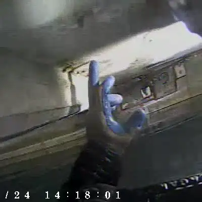 A hand pointing out a joint in a box culvert