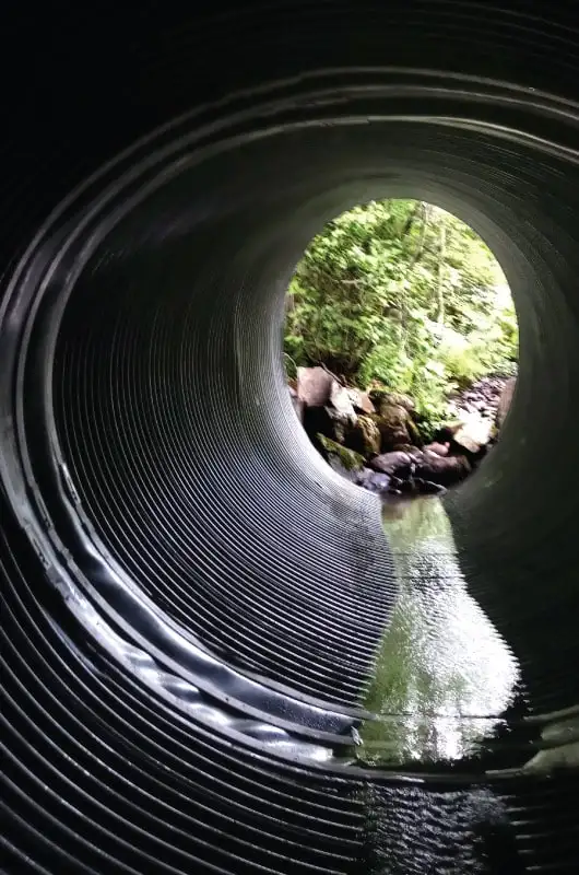 HydraTite installed with three retaining bands in a. corrugated metal pipe