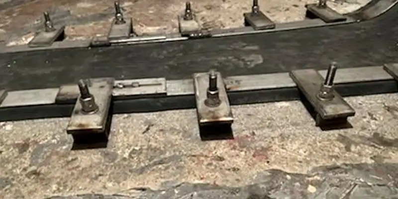 A side of a box-shaped flume that has a HydraTite seal covering a joint