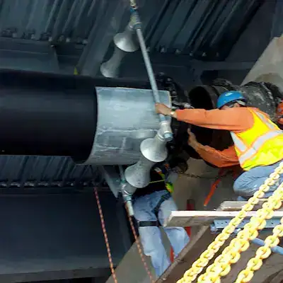 A newly installed pipe being opened back up