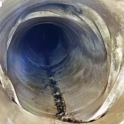 A compromised liner inside a pipe that has become disconnected from the interior wall of the pipe