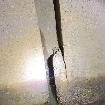 A culvert joint that has a previous repair failing and falling out