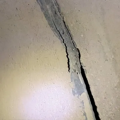 A culvert joint that has a previous repair failing and falling out