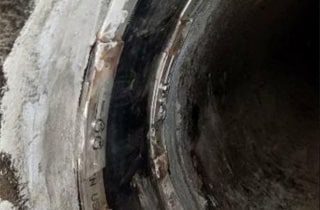 A ductile iron pipe sealed with HydraTite