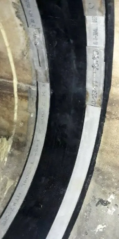 HydraTite installed over a joint in a pipe that has ice on the invert