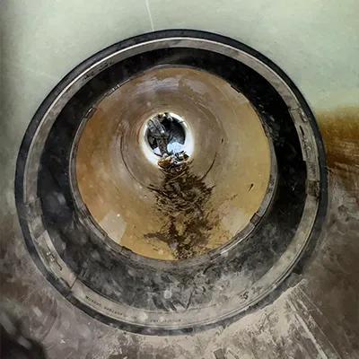 HydraTite bridging the transition between a concrete and steel pipe