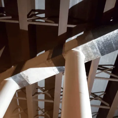 Fiber wrapped portions of a bridge supports