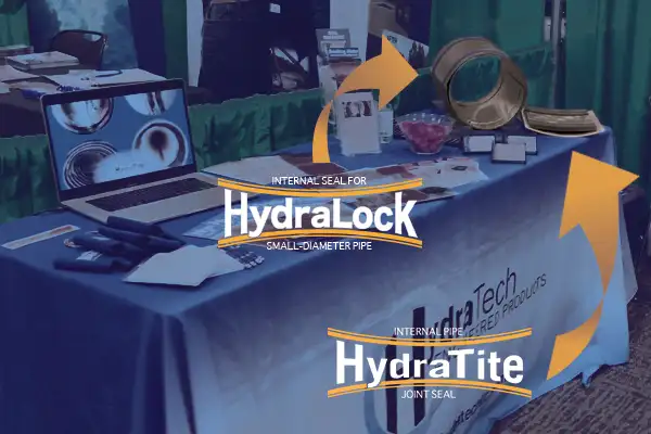 HydraLock and HydraTite on display on a table at an Ohio stormwater conference