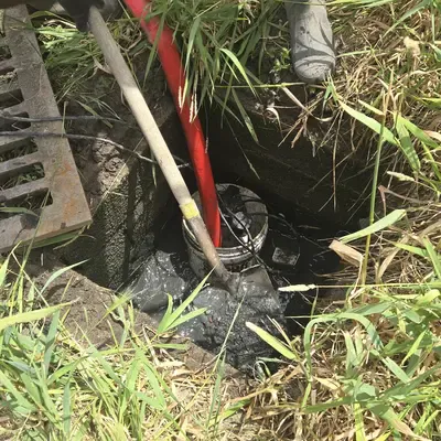 Cleaning out a stormwater culvert