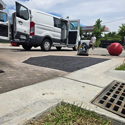 A patch of concrete in a parking lot